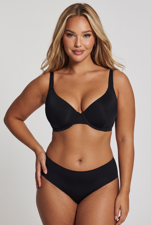 Model wearing the black DualPull bra and brief, front view